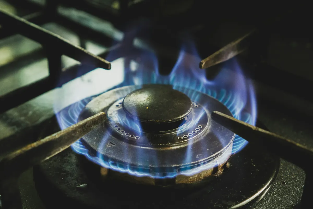 Blue gas flame on a kitchen stove in Germany
